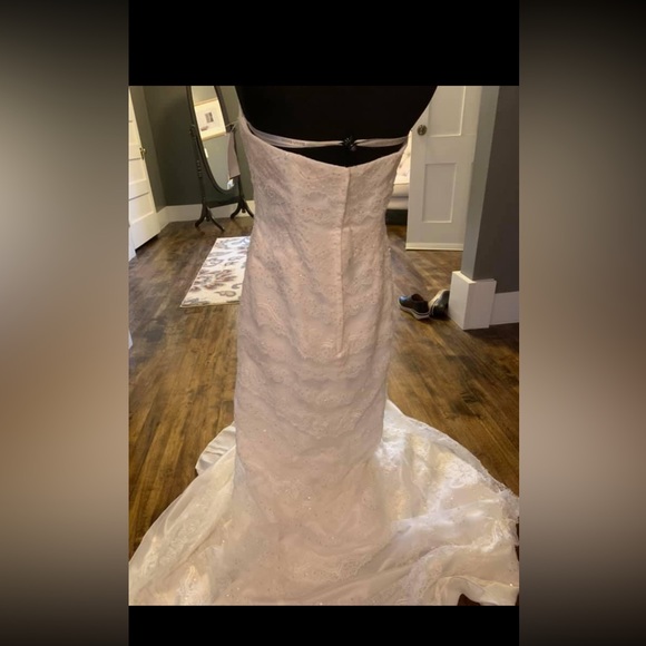 Wedding dress size 10, never worn (for the big day) or altered. - Picture 2 of 7